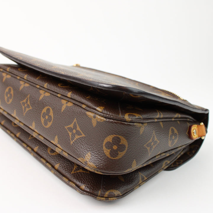 Louis Vuitton Metis Clutch