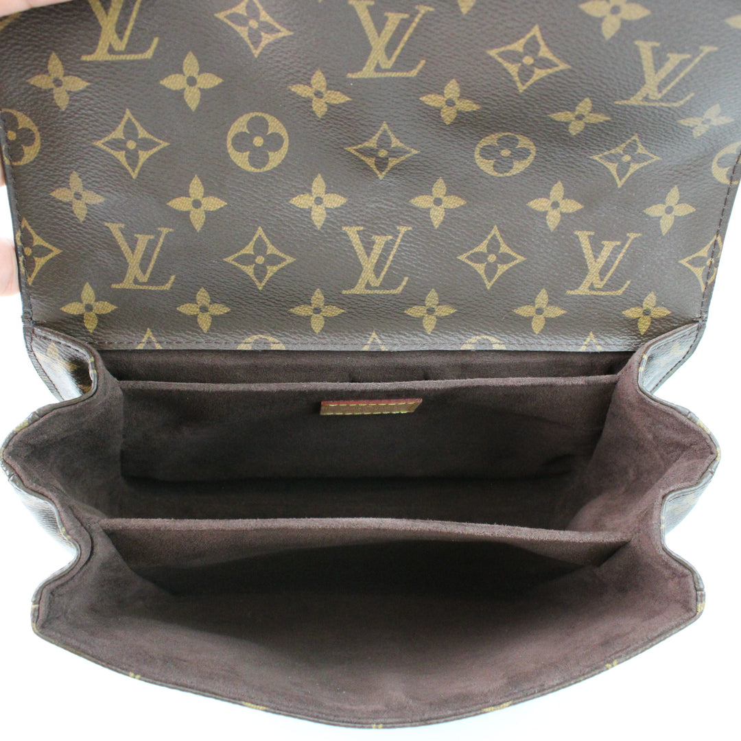 Louis Vuitton Metis Clutch