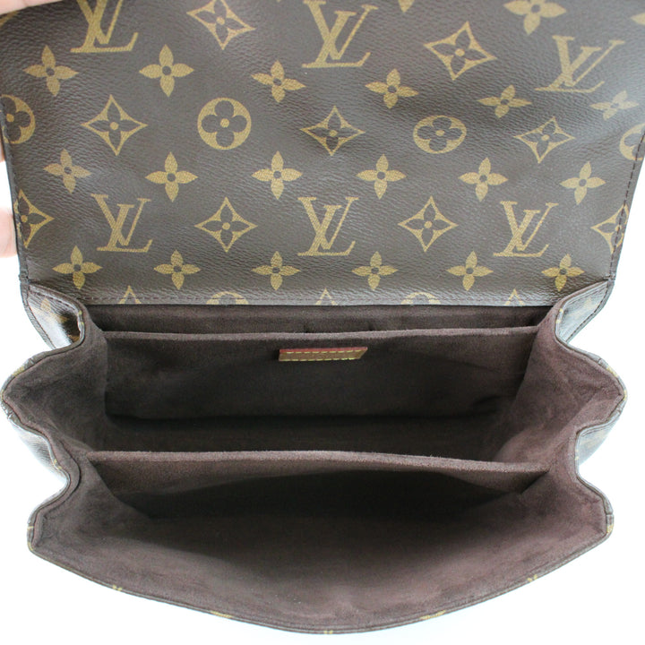 Louis Vuitton Metis Clutch