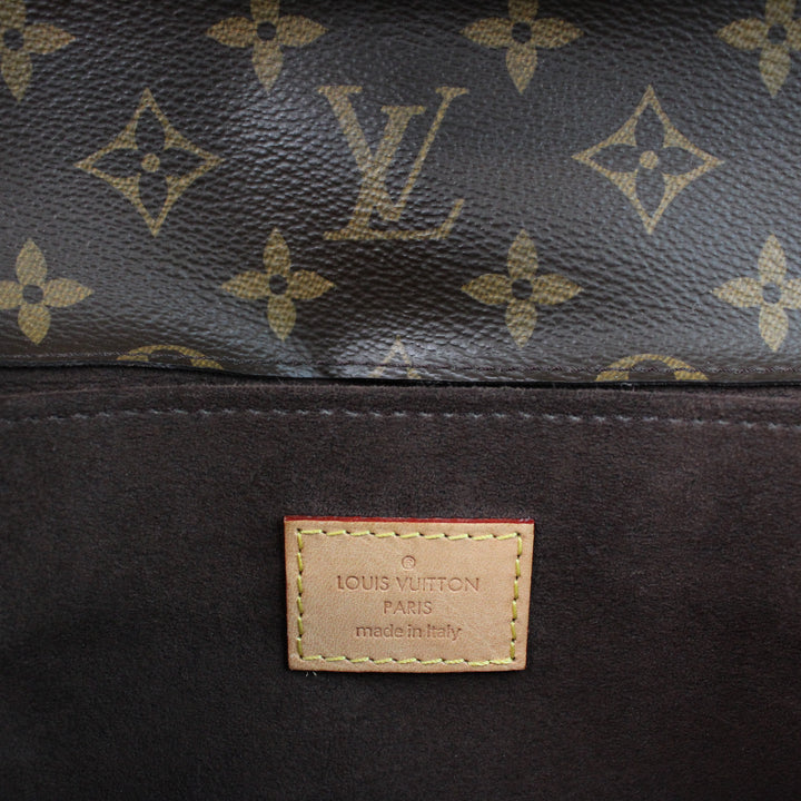 Louis Vuitton Metis Clutch