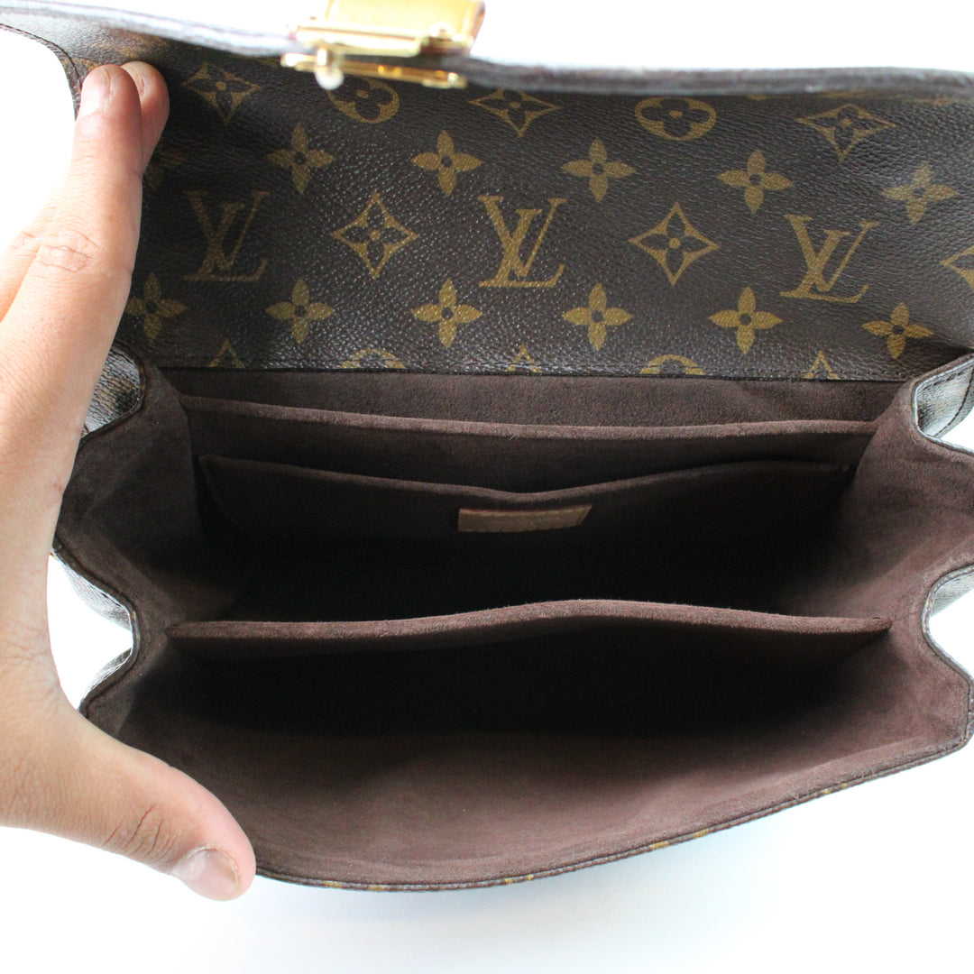 Louis Vuitton Metis Clutch