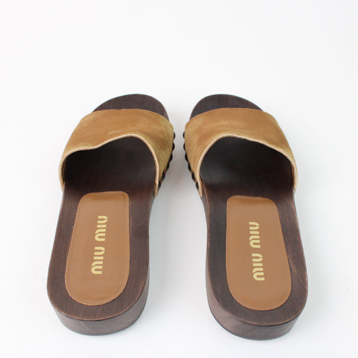 Miu Miu clogs in faded suede