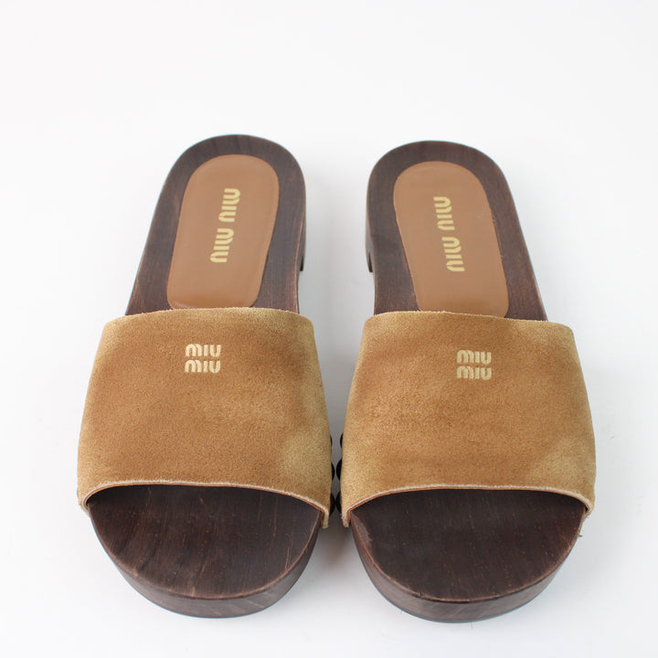 Miu Miu clogs in faded suede