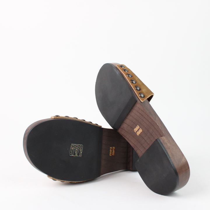 Miu Miu clogs in faded suede