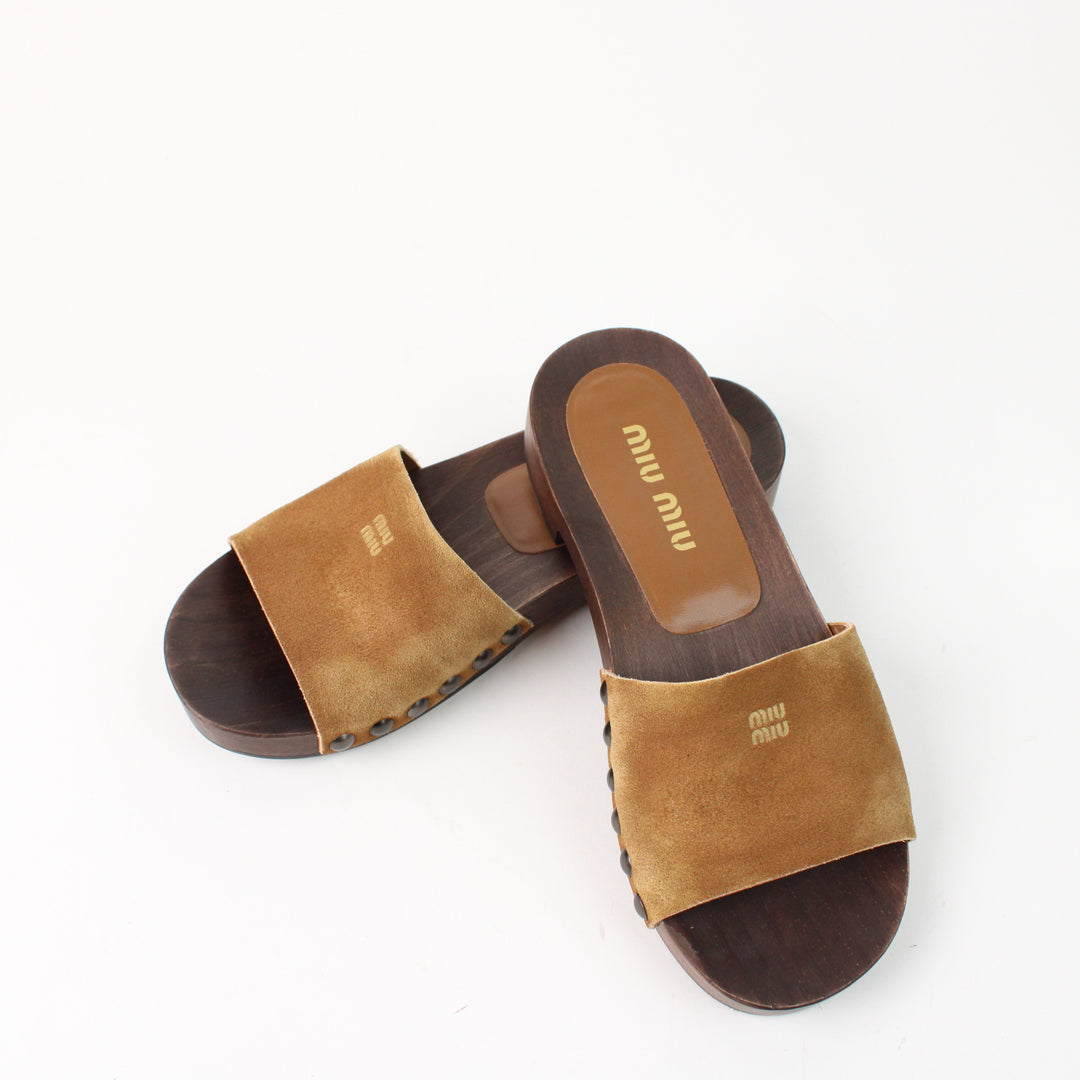 Miu Miu clogs in faded suede