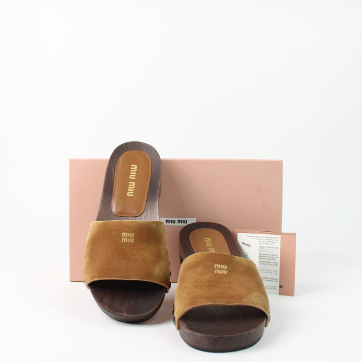 Miu Miu clogs in faded suede