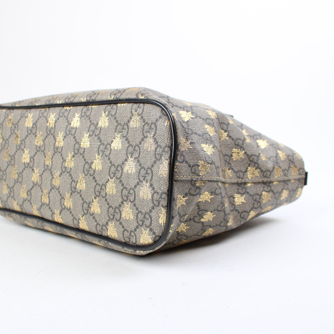 Gucci GG Supreme con Api