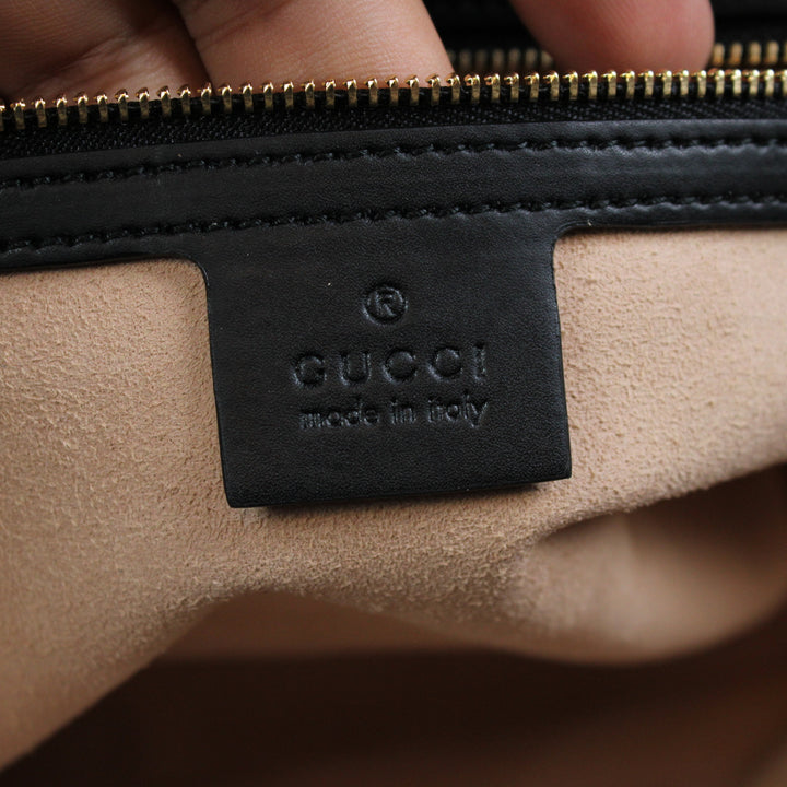 Gucci GG Supreme con Api