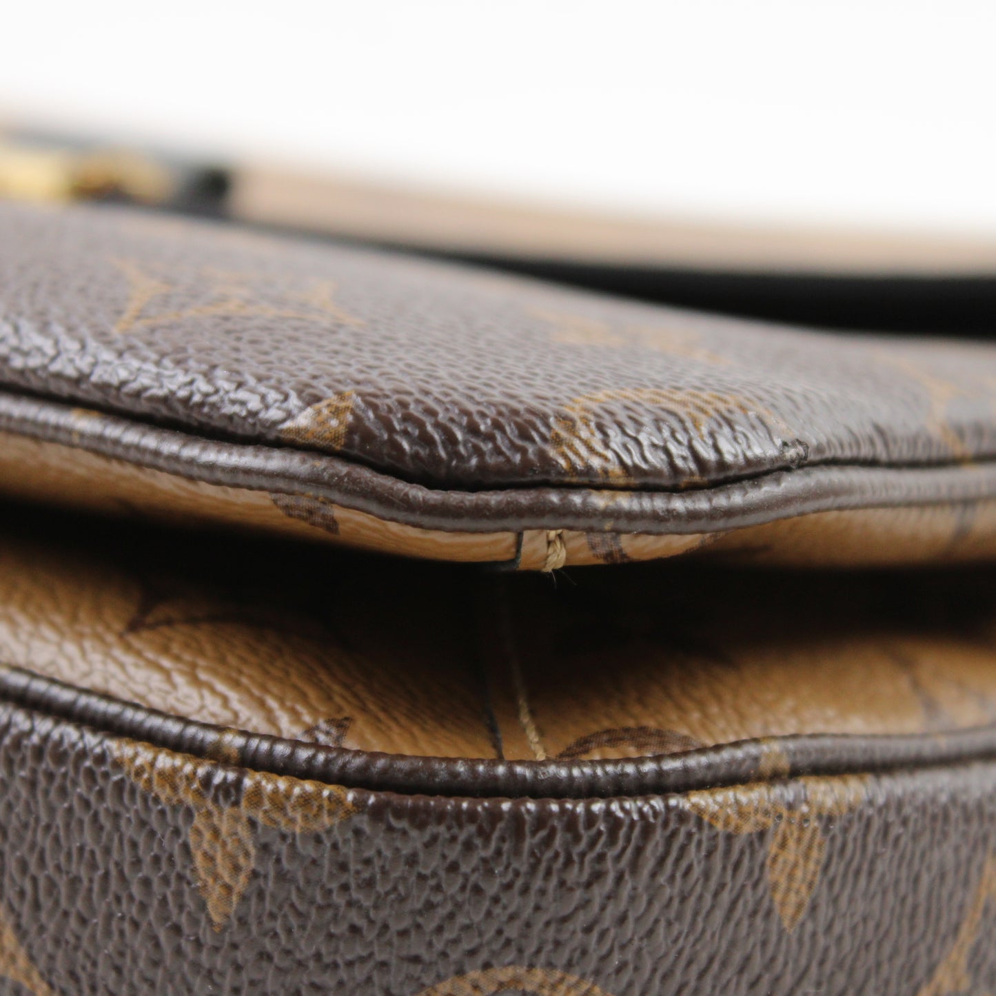 Louis Vuitton Pochette Métis Reverse