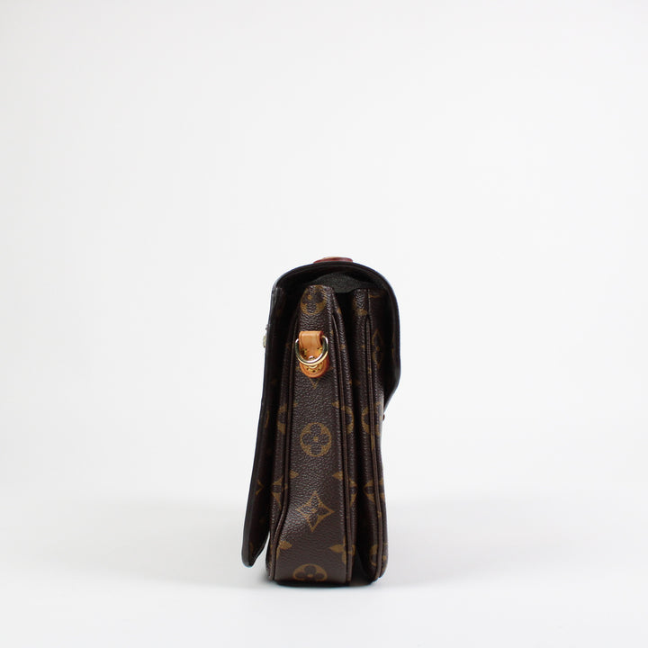 Louis Vuitton Metis Clutch