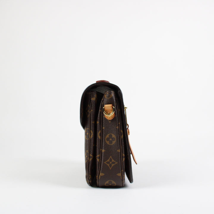 Louis Vuitton Metis Clutch