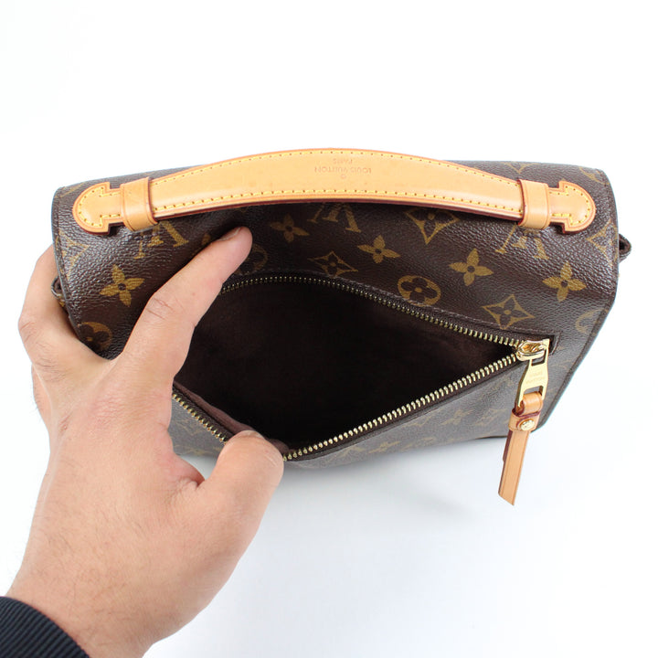 Louis Vuitton Metis Clutch