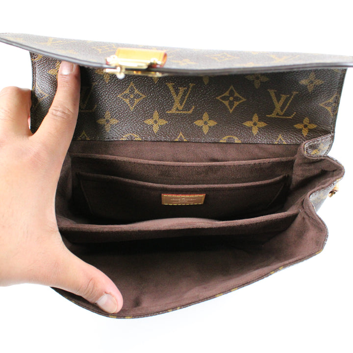 Louis Vuitton Metis Clutch