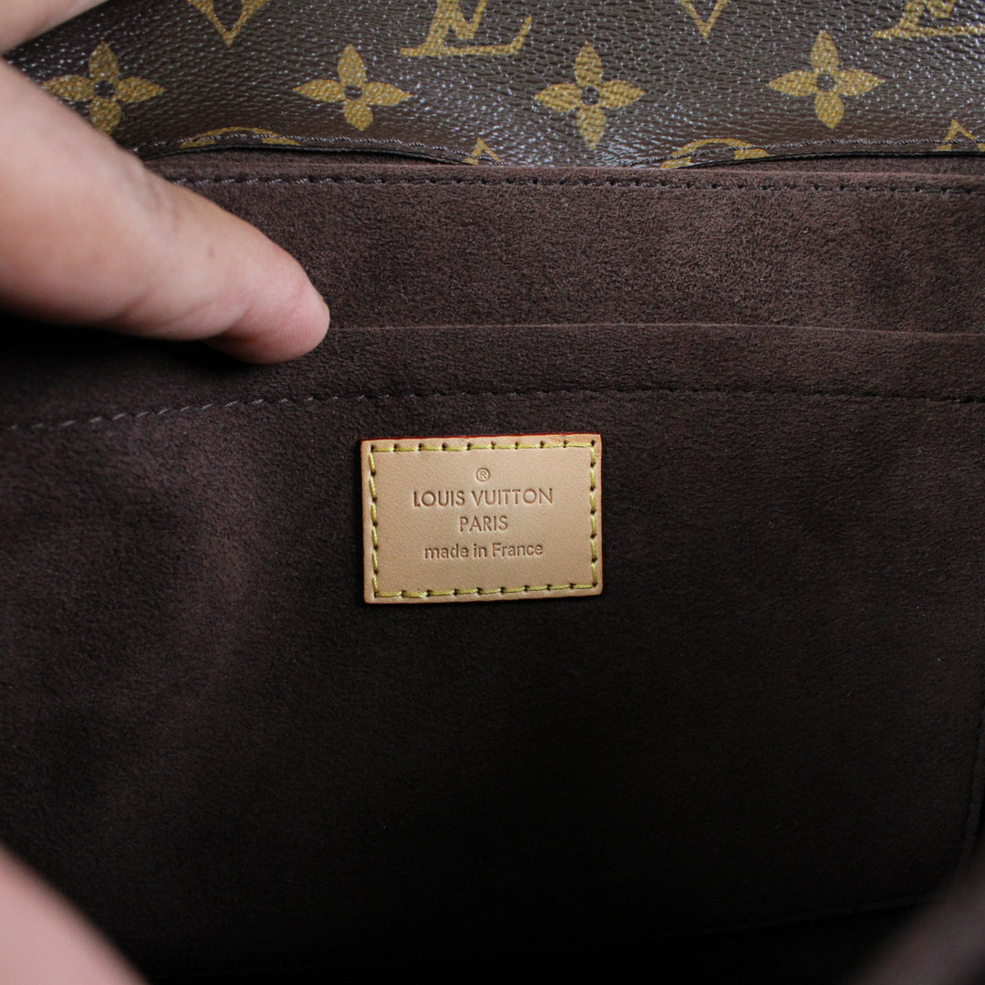 Louis Vuitton Metis Clutch